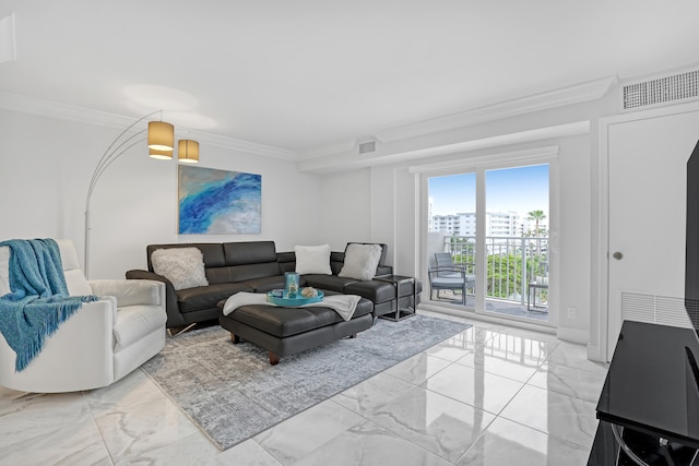 living room with ornamental molding and light tile patterned floors