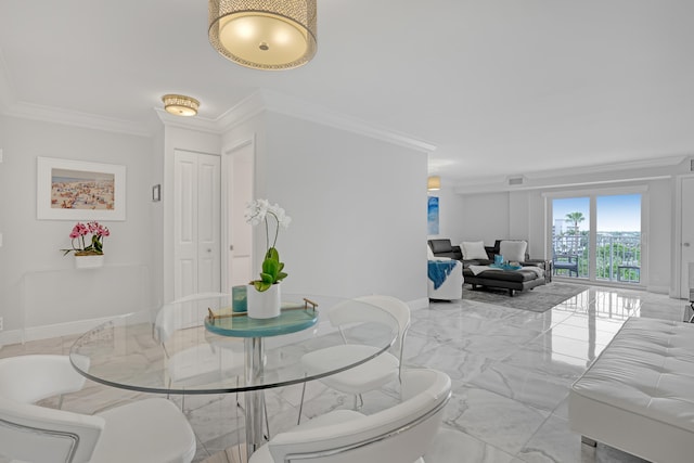 dining space featuring ornamental molding, marble finish floor, visible vents, and baseboards