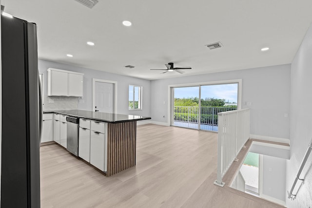 kitchen with ceiling fan, stainless steel dishwasher, fridge, light wood-type flooring, and white cabinets