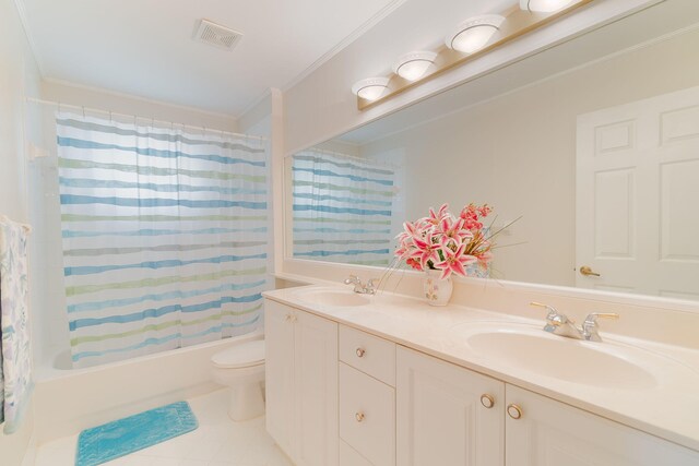 full bathroom with tile flooring, shower / tub combo with curtain, dual bowl vanity, ornamental molding, and toilet