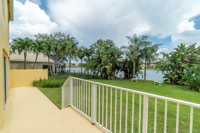 balcony featuring a water view