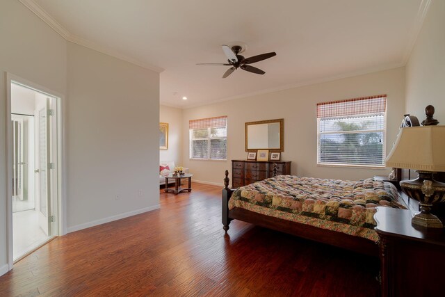 bedroom featuring ceiling fan, hardwood / wood-style flooring, and crown molding