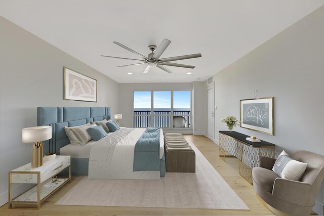 bedroom featuring access to outside, ceiling fan, and hardwood / wood-style floors