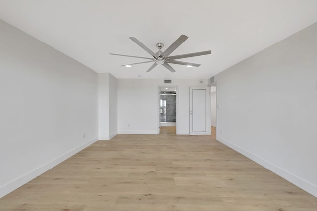 unfurnished bedroom with light hardwood / wood-style flooring, ensuite bath, and ceiling fan