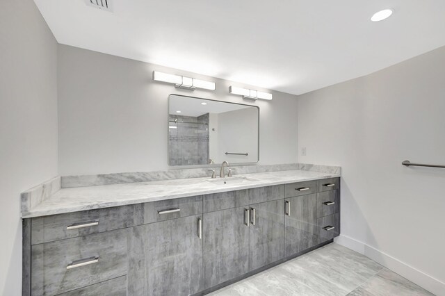 bathroom featuring vanity and tile patterned flooring