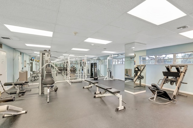 gym featuring a drop ceiling