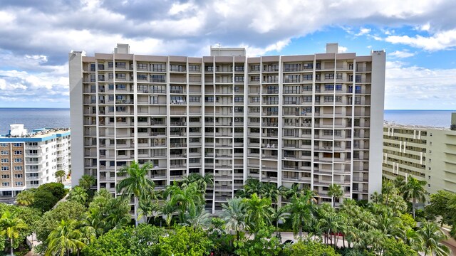 view of building exterior with a water view