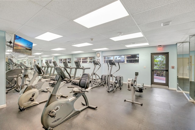 workout area with a drop ceiling