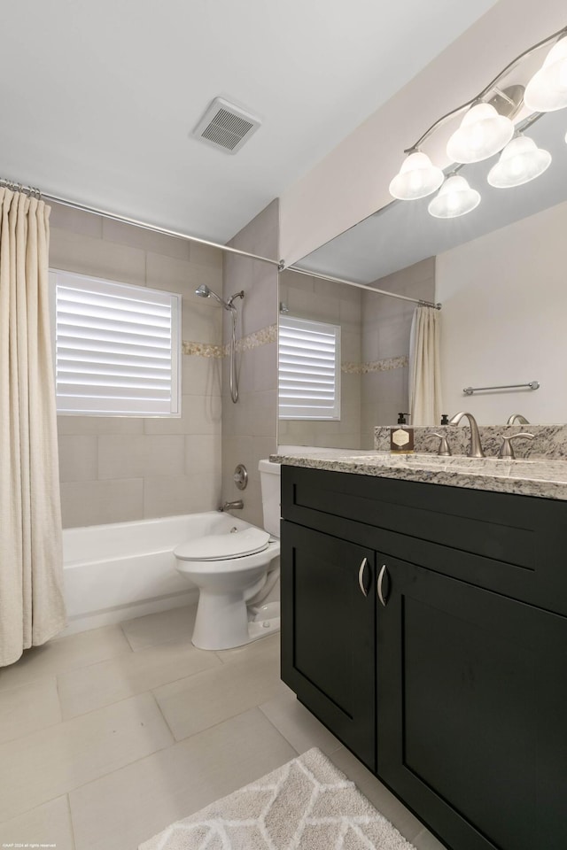 full bathroom with visible vents, toilet, tile patterned floors, shower / bathtub combination with curtain, and vanity