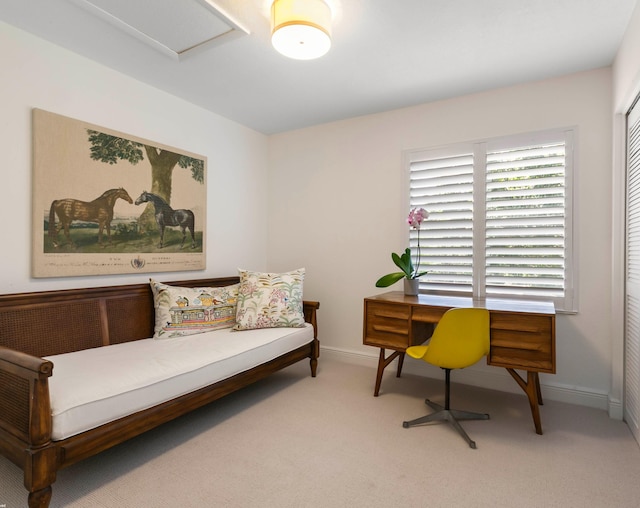 sitting room with light colored carpet