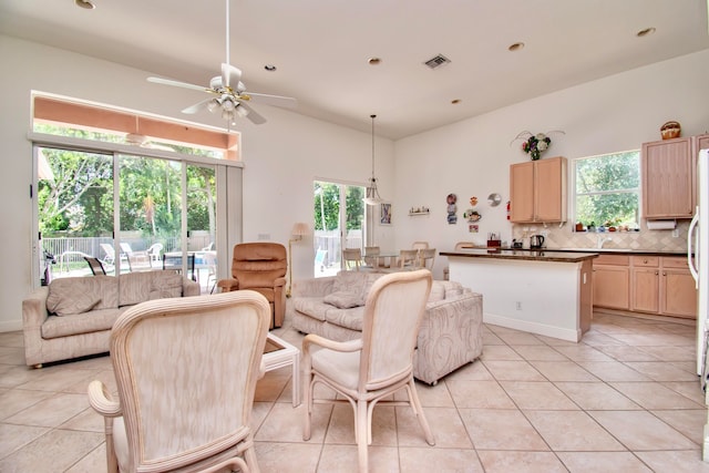 interior space featuring a wealth of natural light and light tile patterned flooring