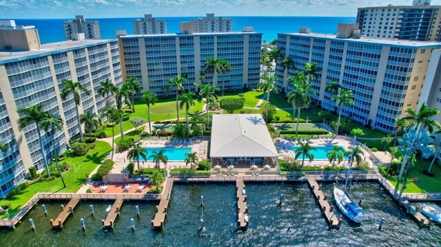 birds eye view of property featuring a water view