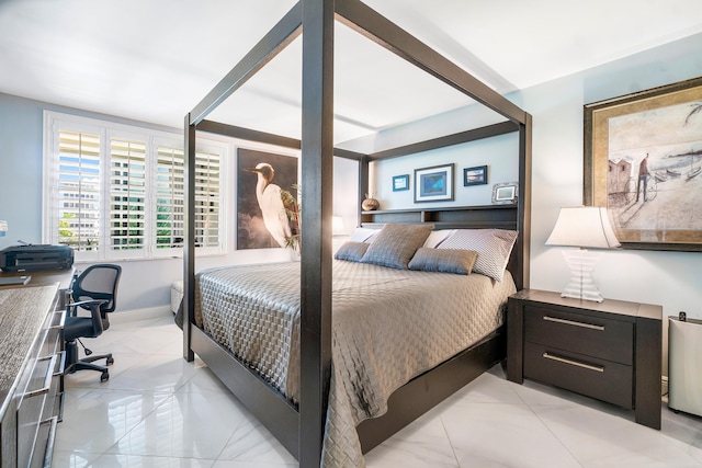 bedroom featuring light tile patterned floors