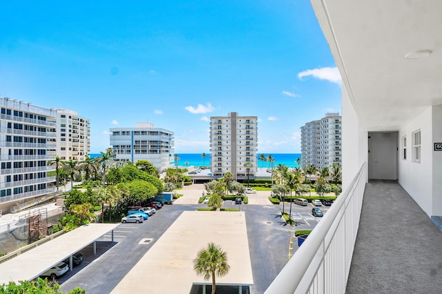 balcony featuring a water view