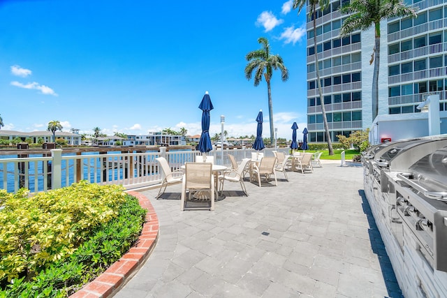 view of patio featuring a water view