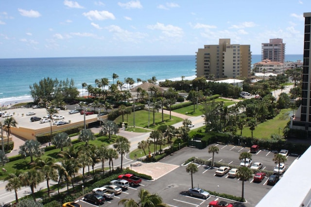 aerial view with a view of the beach and a water view