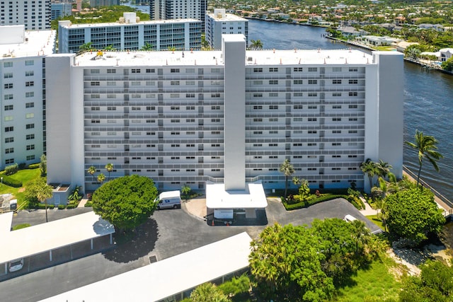 view of building exterior with a water view