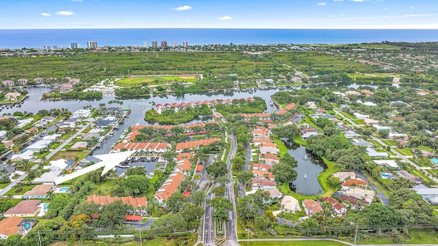 drone / aerial view featuring a water view