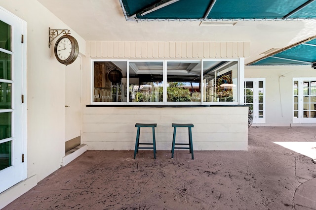 view of patio / terrace with an outdoor bar