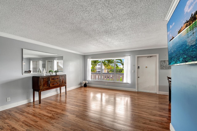 living room featuring crown molding, a textured ceiling, and wood-type flooring