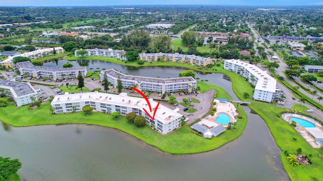 birds eye view of property featuring a water view