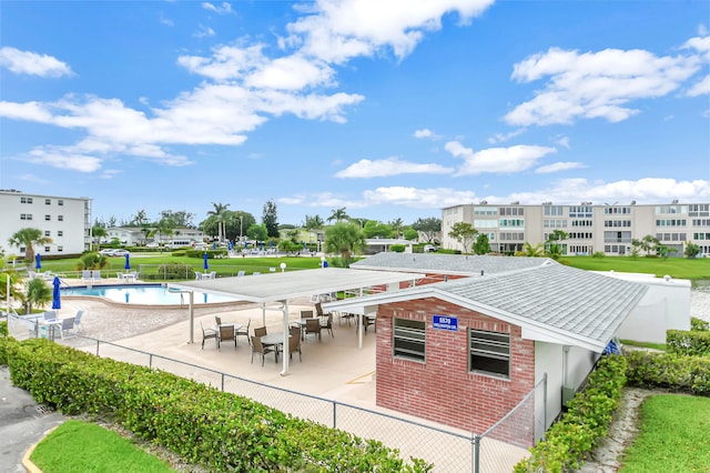 view of terrace featuring a community pool