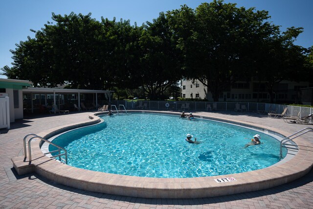 view of swimming pool featuring a patio