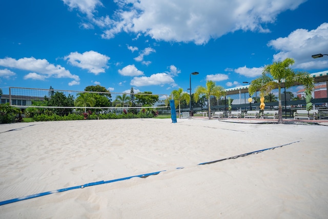 view of property's community featuring volleyball court