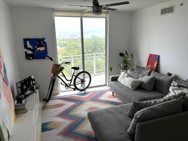 living room featuring ceiling fan