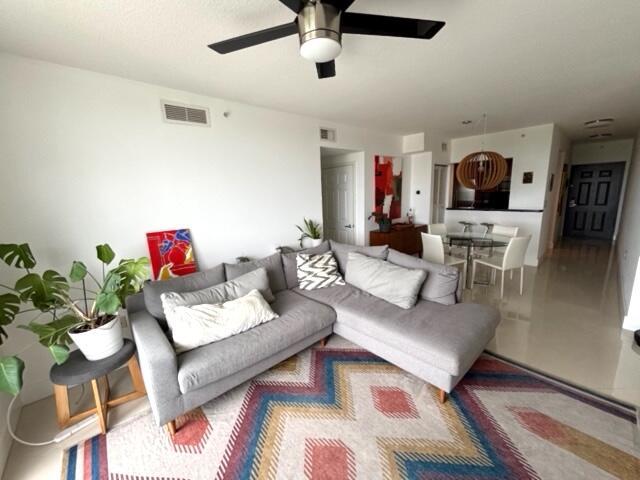 living room featuring ceiling fan