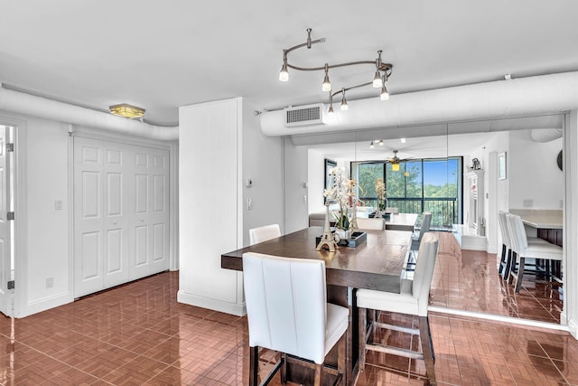 dining room featuring ceiling fan