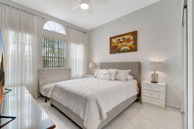 bedroom featuring ceiling fan and light tile patterned floors