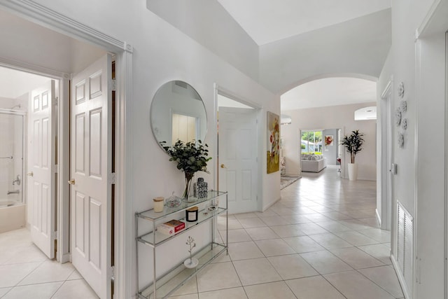 hallway featuring light tile patterned flooring