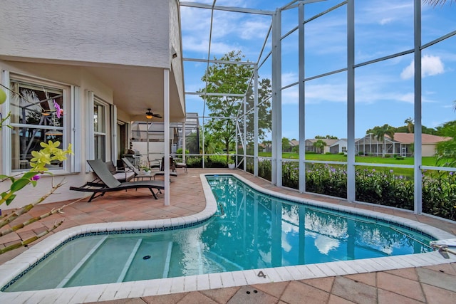 view of pool featuring a patio and a lanai