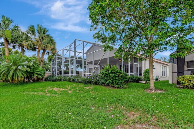 view of yard featuring a lanai