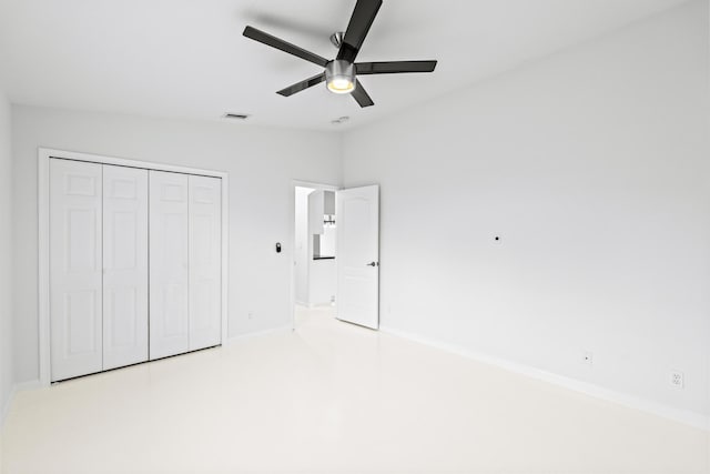 unfurnished bedroom with a closet and ceiling fan