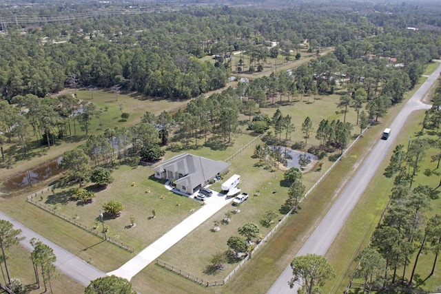 birds eye view of property with a rural view