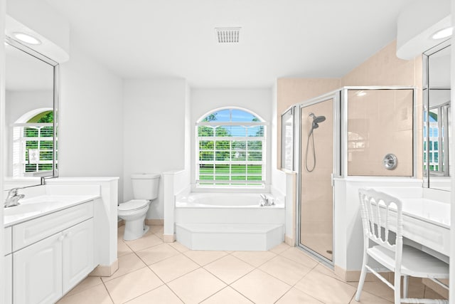 full bathroom with tile patterned floors, toilet, vanity, and shower with separate bathtub