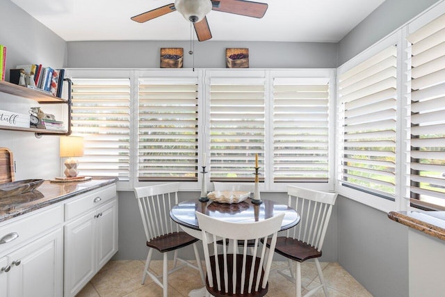 10093 Quail Covey Road Hibiscus N, Boynton Beach, FL 33436 - dining room with light tile patterned floors and ceiling fan
