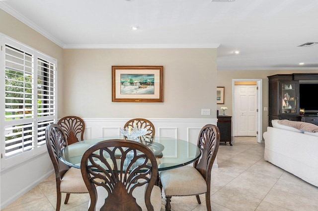 10093 Quail Covey Road Hibiscus N, Boynton Beach, FL 33436 - dining area with crown molding, light tile patterned floors, wainscoting, and recessed lighting