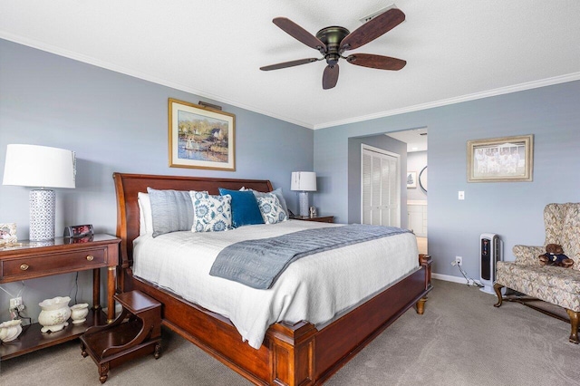 bedroom featuring ceiling fan, a closet, light colored carpet, and ornamental molding