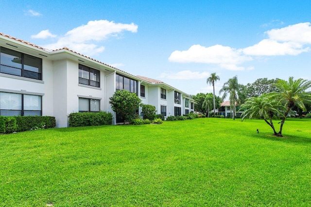 surrounding community featuring a lawn