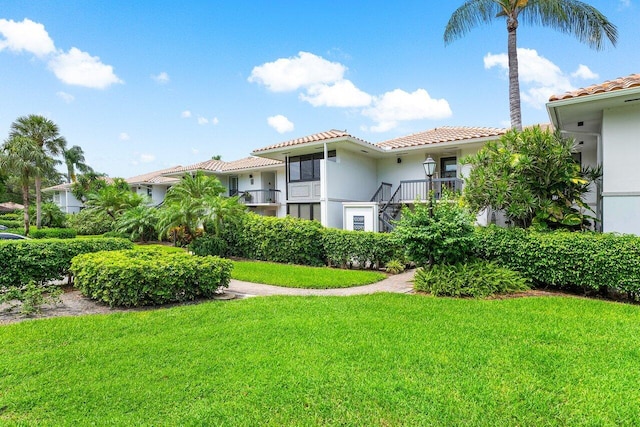 10093 Quail Covey Road Hibiscus N, Boynton Beach, FL 33436 - surrounding community with a lawn