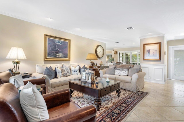 living room featuring light tile patterned floors and crown molding