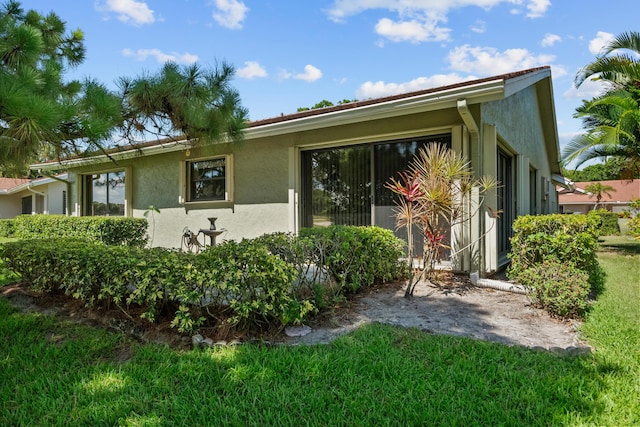 exterior space with a lawn