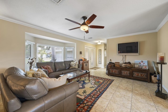 living room featuring light tile patterned floors, crown molding, and ceiling fan