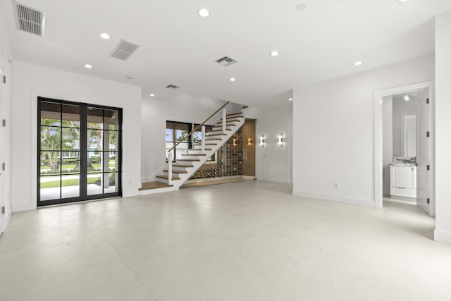 empty room featuring french doors