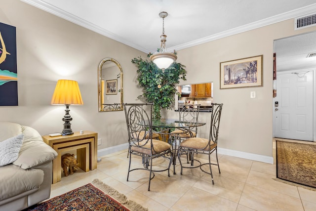 tiled dining space with ornamental molding