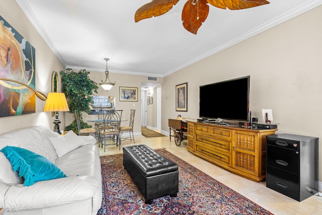 tiled living room featuring ceiling fan and crown molding