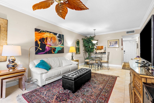 tiled living room with ceiling fan and ornamental molding